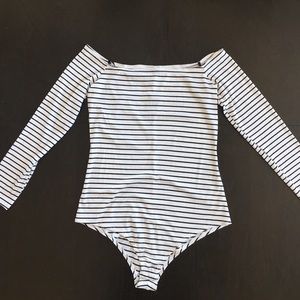 Off shoulder bodysuit. NEW with tag